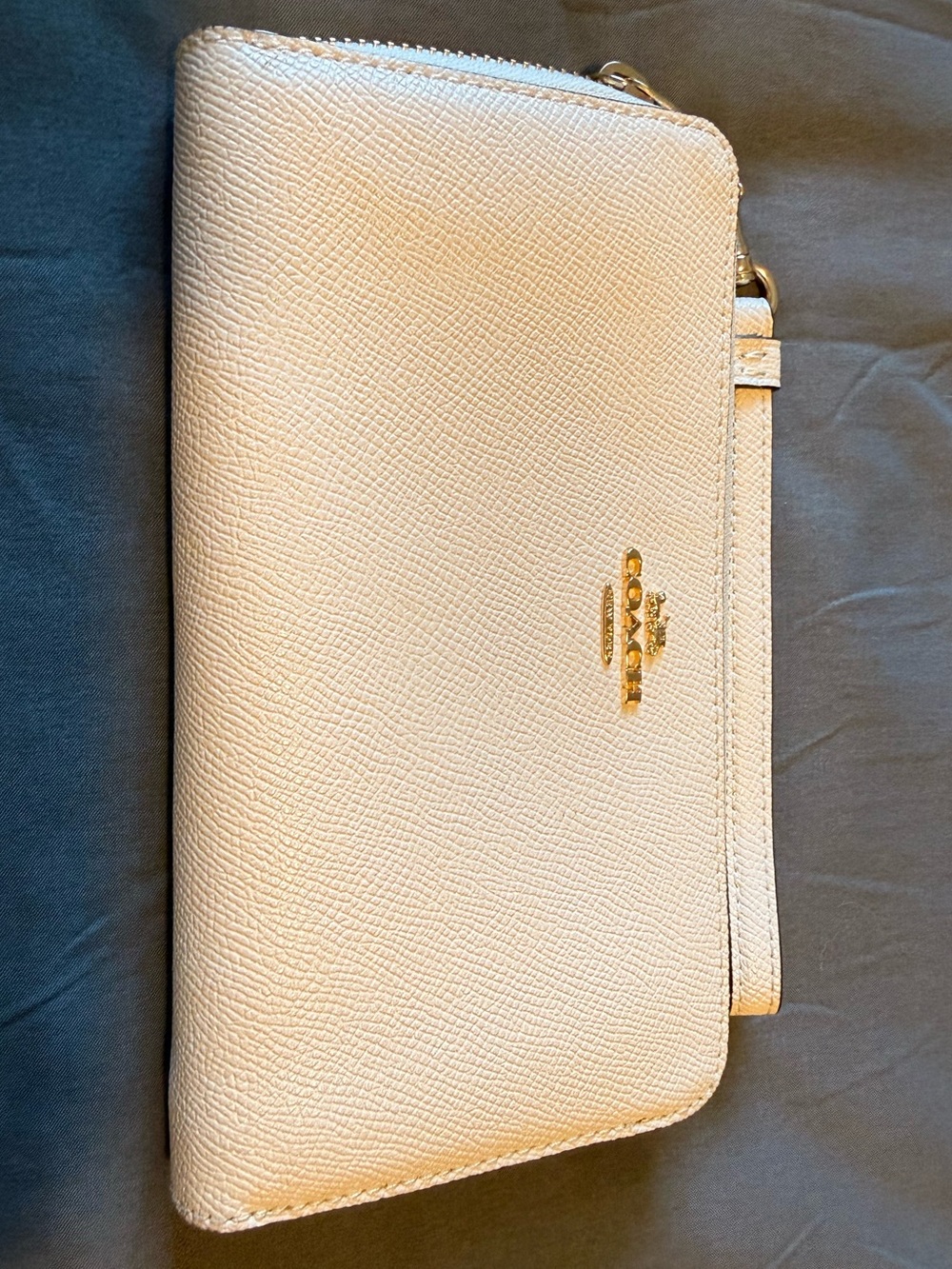 Coach Light Cream Pebbled Leather Wristlet with Gold Logo
